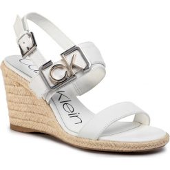 Espadryle CALVIN KLEIN - Belora B4E7907 White. Białe espadryle damskie Calvin Klein, bez wzorów, ze skóry, bez obcasa, na obcasie. Za 549,00 zł.