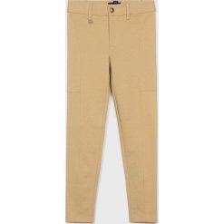 Polo Ralph Lauren - Spodnie dziecięce 128-176 cm. Spodnie dziewczęce Polo Ralph Lauren, bez wzorów, z elastanu. W wyprzedaży za 239,90 zł.