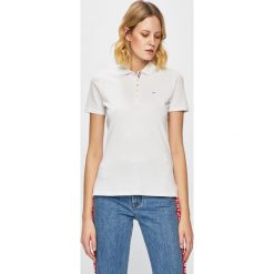 Tommy Jeans - Top. Białe bluzki damskie Tommy Jeans, s, bez wzorów, z elastanu, bez kołnierzyka. W wyprzedaży za 199,90 zł.