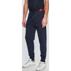 Tommy Hilfiger - Spodnie. Niebieskie spodnie męskie TOMMY HILFIGER, na co dzień, s, bez wzorów, z bawełny, casualowe. W wyprzedaży za 249,90 zł.