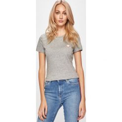 Guess Jeans - T-shirt. Czarne bluzki damskie Guess Jeans, s, z aplikacjami, z bawełny, z okrągłym kołnierzem. Za 139,90 zł.