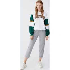 Spodnie tailoring capri. Czarne spodnie damskie Pull&Bear. Za 79,90 zł.