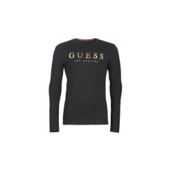 T-shirty z długim rękawem Guess SHOWY. Czarne t-shirty męskie Guess, xxl, z aplikacjami, bez kołnierzyka, długie. Za 179,00 zł.