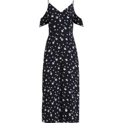 Whistles MICRO TULIP PRINT COLD SHOULDER Kombinezon navy. Niebieskie kombinezony damskie marki Whistles, z wiskozy. W wyprzedaży za 699,30 zł.