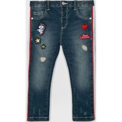 Blukids - Jeansy dziecięce 74-98 cm. Niebieskie jeansy dziewczęce Blukids, bez wzorów, z elastanu. W wyprzedaży za 49,90 zł.