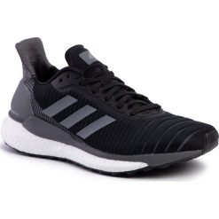 Buty adidas - Solar Glide 19 W F34085 Cblack/Grefiv/Ftwwht. Czarne buty sportowe damskie Adidas, bez wzorów, ze skóry ekologicznej, sportowe, do biegania. W wyprzedaży za 389,00 zł.