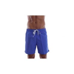 Szorty i Bermudy Calvin Klein Jeans KM0KM00219 MD DRAWSTRING. Niebieskie spodenki i szorty męskie Calvin Klein Jeans, s, bez wzorów, z jeansu. Za 169,03 zł.
