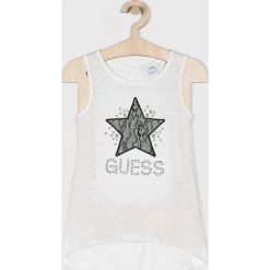Guess Jeans - Top dziecięcy 118-175 cm. Białe bluzki dziewczęce Guess Jeans, z nadrukiem, z bawełny, z okrągłym kołnierzem, bez rękawów, bez kaptura. W wyprzedaży za 99,90 zł.