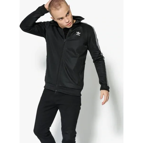 Adidas Bluza Beckenbauer Tt Adicolor , czarny, rozmiar M. Czarne bluzy męskie Adidas, m, w paski, z bawełny, klasyczne, z klasycznym kołnierzykiem, bez rękawów, bez kaptura. W wyprzedaży za 229,99 zł.