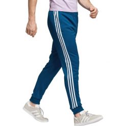 Adidas Originals SST Spodnie dresowe Niebieski. Niebieskie spodnie męskie adidas Originals, xxl, bez wzorów, z bawełny. Za 309,95 zł.