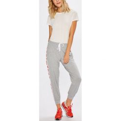 Dkny - Spodnie. Szare legginsy sportowe damskie DKNY, s, bez wzorów, z elastanu. W wyprzedaży za 179,90 zł.