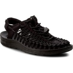 Sandały KEEN - Uneek 1014099 Black/Black. Czarne klapki damskie marki Keen, bez wzorów, z materiału, bez obcasa. Za 409,95 zł.