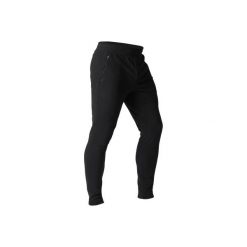 Spodnie dresowe skinny Gym & Pilates 500 zip męskie. Czarne spodnie męskie DOMYOS, m, bez wzorów, z elastanu. Za 64,99 zł.