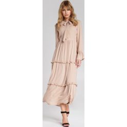 Beżowa Sukienka Jimmie. Brązowe sukienki damskie Renee, s, eleganckie, z kokardą, długie, maxi, rozkloszowane. Za 159,99 zł.
