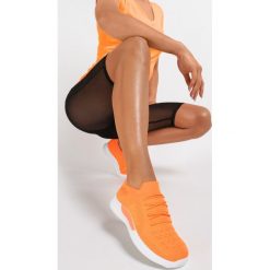 Pomarańczowe Buty Sportowe Sireiriel. Pomarańczowe buty sportowe damskie Renee, bez wzorów, sportowe. W wyprzedaży za 79,99 zł.