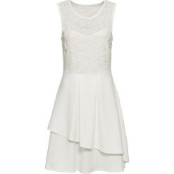 Sukienka z koronką bonprix kremowy. Brązowe sukienki damskie bonprix, w koronkowe wzory, z koronki, eleganckie, bez kołnierzyka, bez rękawów. Za 129,99 zł.