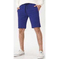 Szorty basic - Fioletowy. Fioletowe spodenki i szorty męskie House, s, bez wzorów. Za 69,99 zł.