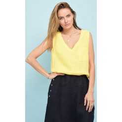 Lniany top w kolorze żółtym. Żółte bluzki damskie marki Rodier, bez wzorów, ze lnu, z okrągłym kołnierzem. W wyprzedaży za 85,95 zł.
