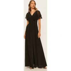 Karl Lagerfeld - Sukienka. Czarne sukienki damskie KARL LAGERFELD, bez wzorów, z jedwabiu, bez kołnierzyka, z krótkim rękawem, krótkie, mini, rozkloszowane. Za 1959,00 zł.