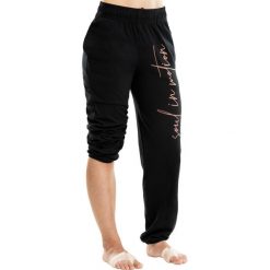 Spodnie do tańca nowoczesnego damskie. Czarne spodnie damskie DOMYOS, s, bez wzorów, z bawełny, na fitness i siłownię. Za 74,99 zł.