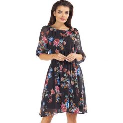 Sukienka w kolorze czarnym ze wzorem. Czarne sukienki damskie Far Far Fashion, Ryłko by Agnes&Paul, bez wzorów, z okrągłym kołnierzem, z długim rękawem, długie, maxi. W wyprzedaży za 179,95 zł.