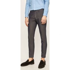 Trussardi Jeans - Spodnie. Niebieskie spodnie męskie z elastanu, casualowe. Za 539,90 zł.