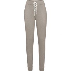 Spodnie dresowe bonprix brunatny "used". Pomarańczowe spodnie dresowe damskie marki bonprix, z dresówki, sportowe. Za 54,99 zł.