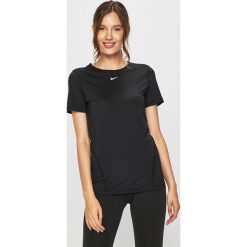 Nike - T-shirt. Zielone topy damskie Nike, s, bez wzorów, z elastanu, z okrągłym kołnierzem. W wyprzedaży za 99,90 zł.