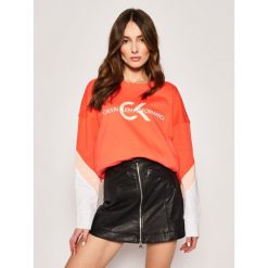 Bluza Calvin Klein Performance 00GWS0W307. Pomarańczowe bluzy damskie Calvin Klein Performance, xs, bez wzorów, z bawełny, bez rękawów, bez kaptura. W wyprzedaży za 319,00 zł.