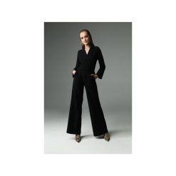 Kombinezon Savage - czarny. Czarne kombinezony damskie marki Madnezz, s, w paski, z elastanu, eleganckie, bez kołnierzyka, bez rękawów. Za 349,00 zł.