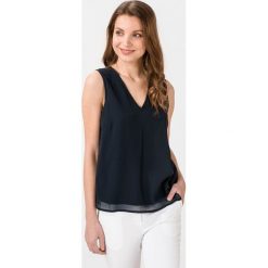 Vero Moda Julian Top Niebieski. Niebieskie podkoszulki damskie Vero Moda, s, bez wzorów, z poliesteru, bez rękawów. Za 109,95 zł.