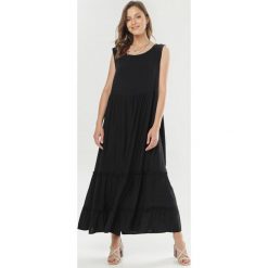 Czarna Sukienka Dalivere. Czarne sukienki damskie Born2be, na lato, s, bez wzorów, bez kołnierzyka, bez rękawów. W wyprzedaży za 54,99 zł.