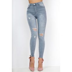 Szare jeansy high waist z rozdarciami. Szare jeansy damskie marki N/A, z podwyższonym stanem. Za 59,99 zł.