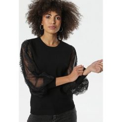 Czarny Sweter Tasmin. Czarne swetry damskie Born2be, s, z aplikacjami, z dzianiny, z długim rękawem, długie, bez kaptura. Za 109,99 zł.
