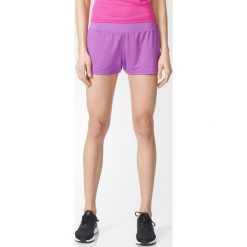 Spodenki adidas Grete Shorts W Fioletowe. Fioletowe spodenki sportowe damskie Adidas, bez wzorów, z tkaniny, do biegania. Za 49,99 zł.