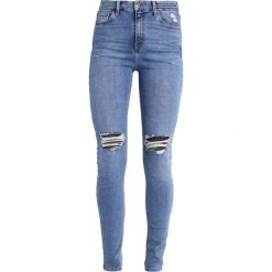 Topshop Tall RIP JAMIE Jeans Skinny Fit middenim. Niebieskie rurki damskie marki Topshop Tall, z elastanu. W wyprzedaży za 179,25 zł.