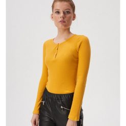 Bawełniana bluzka basic - Żółty. Żółte bluzki damskie Sinsay, s, bez wzorów, z bawełny, bez kołnierzyka, bez rękawów. Za 24,99 zł.