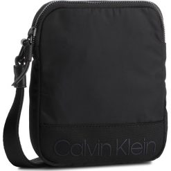 Saszetka CALVIN KLEIN - Shadow Mini Reporter K50K504366 001. Czarne torby męskie skórzane Calvin Klein, bez wzorów, z materiału, młodzieżowe. W wyprzedaży za 219,00 zł.