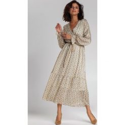 Biała Sukienka Kirstin. Białe sukienki damskie Renee, na imprezę, na wiosnę, s, w paski, z tkaniny, bez kołnierzyka, z długim rękawem, długie, midi, rozkloszowane. Za 139,99 zł.