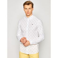 Koszula Tommy Jeans Novel Dobby Poplin DM0DM07910. Białe koszule męskie Tommy Jeans, m, bez wzorów, z bawełny, casualowe, bez kołnierzyka, bez rękawów. W wyprzedaży za 289,00 zł.