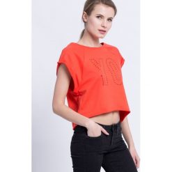 Reebok - Top. Pomarańczowe topy damskie Reebok, s, z bawełny, z okrągłym kołnierzem. W wyprzedaży za 59,90 zł.