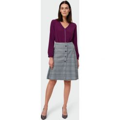 Spódnica trapezowa w kratę - 40. Spódniczki damskie e-margeritka.pl, na zimę, bez wzorów, z poliesteru, eleganckie, midi, rozkloszowane. Za 89,99 zł.