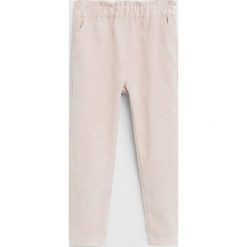 Mango Kids - Spodnie dziecięce Erika 80-104 cm. Różowe spodnie dziewczęce Mango Kids, bez wzorów, z bawełny. W wyprzedaży za 59,90 zł.