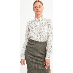 KOSZULA PISA SPORTMAX CODE. Koszule damskie Sportmax Code, bez wzorów, eleganckie, bez kołnierzyka, bez rękawów. Za 929,00 zł.