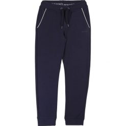 Boss - Spodnie dziecięce 116-152 cm. Niebieskie dresy chłopięce Boss, bez wzorów, z elastanu. Za 249,90 zł.