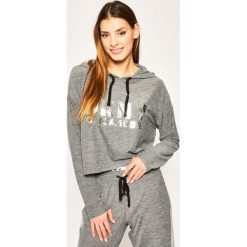 Bluza DKNY YI2022401. Szare bluzy damskie DKNY, s, bez wzorów, z elastanu, bez rękawów, bez kaptura. W wyprzedaży za 229,00 zł.