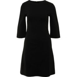 TWINSET ABITO Sukienka z dżerseju nero. Czarne sukienki z falbanami marki Twinset, z dżerseju. Za 669,00 zł.