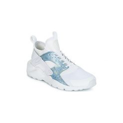 Buty Dziecko Nike AIR HUARACHE RUN ULTRA GROUNDSCHOOL. Białe trampki dziewczęce Nike, bez wzorów, bez zapięcia. Za 328,30 zł.