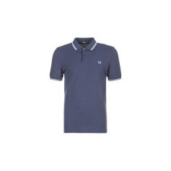 Koszulki polo z krótkim rękawem Fred Perry THE FRED PERRY SHIRT. Niebieskie koszulki polo męskie Fred Perry, s, bez wzorów, z krótkim rękawem. Za 303,20 zł.