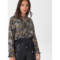Bluzka w kwiaty - Wielobarwny. Bluzki damskie House, s, w kwiaty, bez kołnierzyka, bez rękawów. Za 59,99 zł.